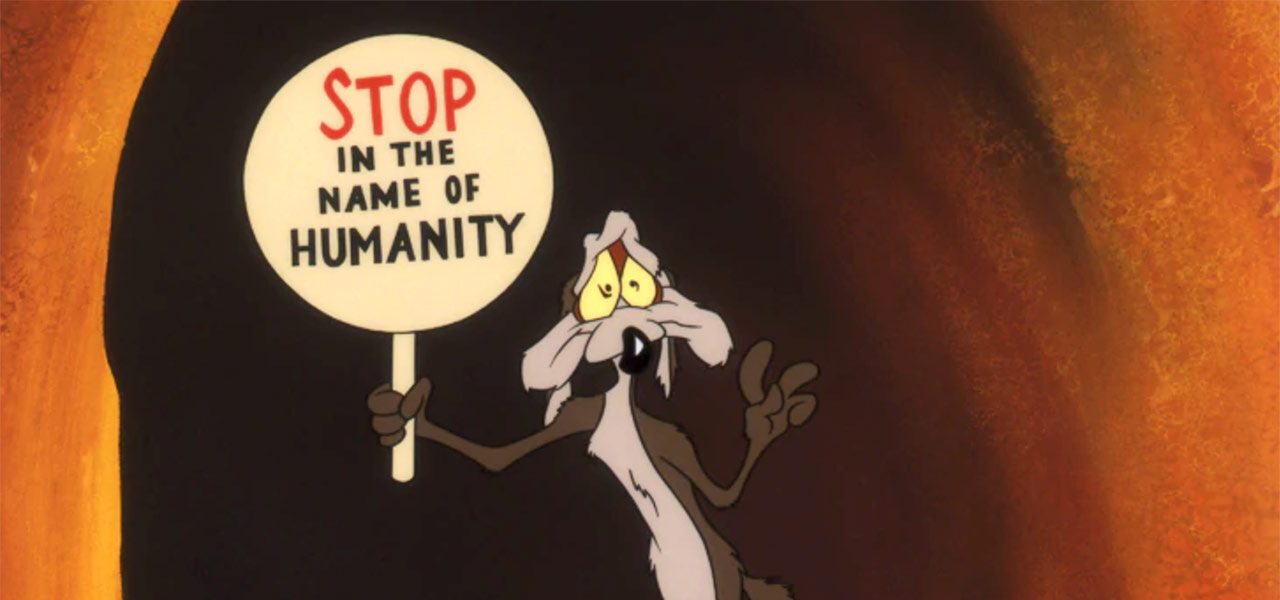 Wile E. Coyote holding sign